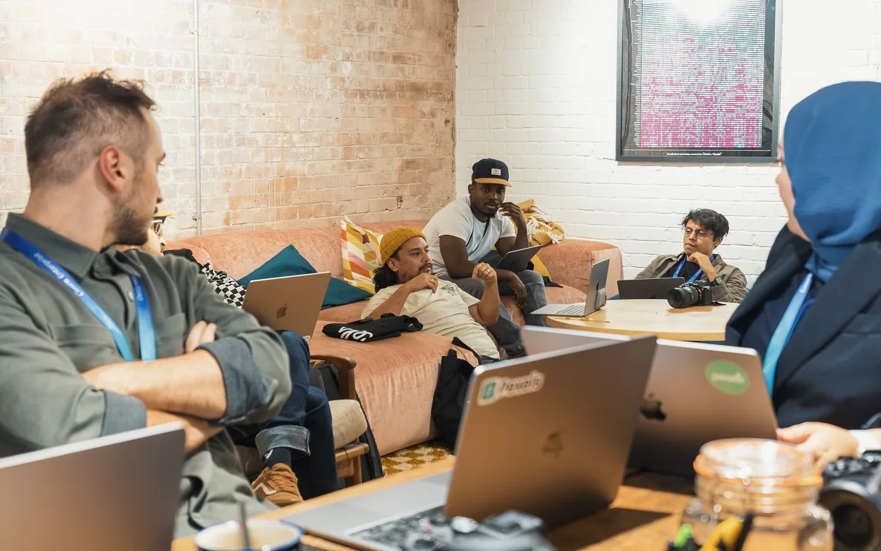 Technology professionals collaborating in a modern workspace